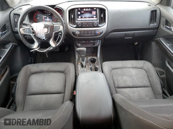 2015 GMC Canyon 2WD SLE with VIN 1GTH5BEA6F1142406, listed as a Copart auction lot 72416354 with 121,670 mi miles and Salvage Title. Bid and sale history available at carsss.com. Image 8.