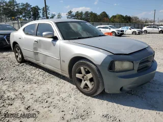 2010 Dodge Charger SXT with VIN 2B3CA3CV7AH210466, listed as a Copart auction lot 50699505 with 205,829 mi miles and Salvage Title. Bid and sale history available at carsss.com. Image 4.