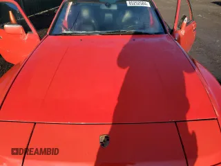 1984 Porsche 944 с VIN WP0AA0946EN459969, выставлен на аукционе Copart как лот 85252584 с пробегом Не указан миль и Списание • Salvage title. История ставок и продаж доступна на DreamBid. Изображение 11.