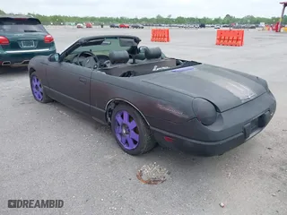 2002 Ford Thunderbird w/Hardtop Premium with VIN 1FAHP60A32Y105748, listed as a IAAI auction lot 41964399 with 1 mi miles. Bid and sale history available at carsss.com. Image 3.