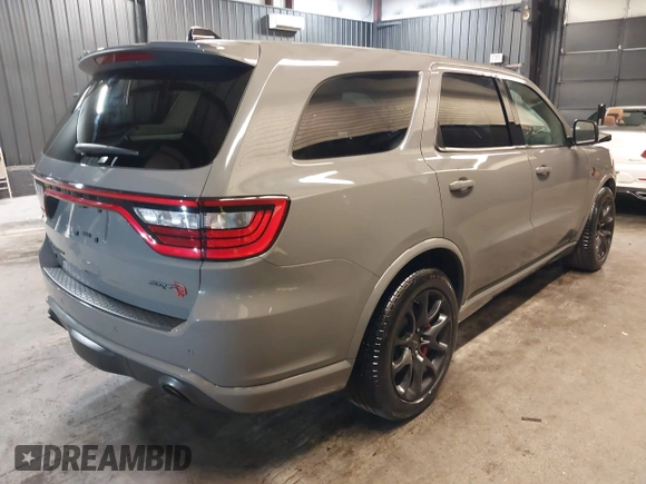 2023 Dodge Durango SRT Hellcat Premium with VIN 1C4SDJH9XPC655507, listed as a IAAI auction lot 42172418 with 1,490 mi miles and . Bid and sale history available at DreamBid. Image 4.