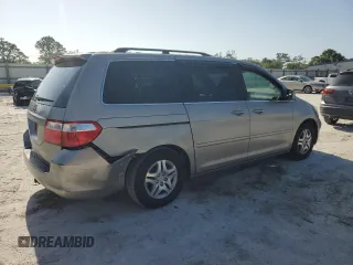 2007 Honda Odyssey EX-L with VIN 5FNRL387X7B043046, listed as a Copart auction lot 52604635 with 228,961 mi miles and Salvage Title. Bid and sale history available at carsss.com. Image 3.