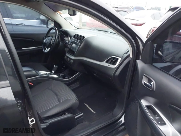 2013 Dodge Journey SXT with VIN 3C4PDCBB1DT565028, listed as a IAAI auction lot 41483127 with 129,997 mi miles. Bid and sale history available at carsss.com. Image 5.