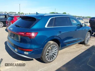 2019 Audi e-tron Prestige with VIN WA1VABGE0KB009718, listed as a IAAI auction lot 42336983 with 54,871 mi miles and . Bid and sale history available at DreamBid. Image 4.