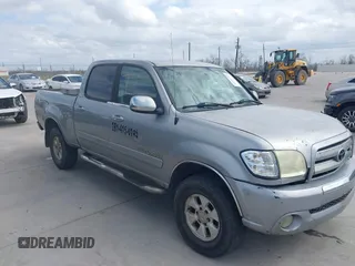 2004 Toyota Tundra SR5 with VIN 5TBET34114S453461, listed as a IAAI auction lot 41764793 with 165,907 mi miles. Bid and sale history available at carsss.com. Image 1.