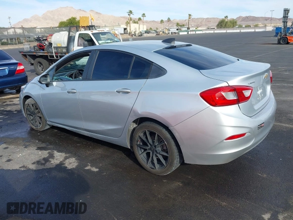 2018 Chevrolet Cruze LS with VIN 1G1BC5SM5J7182051, listed as a IAAI auction lot 41014751 with 112,749 mi miles and . Bid and sale history available at DreamBid. Image 3.