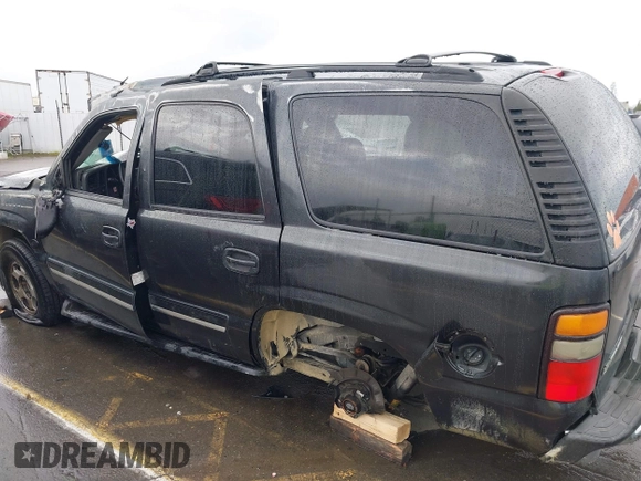2005 Chevrolet Tahoe Z71 with VIN 1GNEC13T15R205653, listed as a IAAI auction lot 41808672 with 210,261 mi miles and . Bid and sale history available at DreamBid. Image 15.
