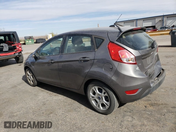 2014 Ford Fiesta SE with VIN 3FADP4EJ0EM195954, listed as a Copart auction lot 51356835 with 75,136 mi miles and Salvage Title. Bid and sale history available at DreamBid. Image 2.