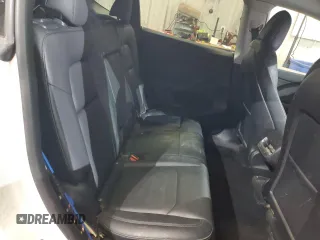 2023 Tesla Model Y Long Range z VIN 7SAYGDEE5PF619265, wystawiony jako Copart lot #48418655 z przebiegiem 42 233 mil mil oraz Szkoda całkowita • Salvage title. Historia ofert i sprzedaży dostępna na DreamBid. Obrazek 11.