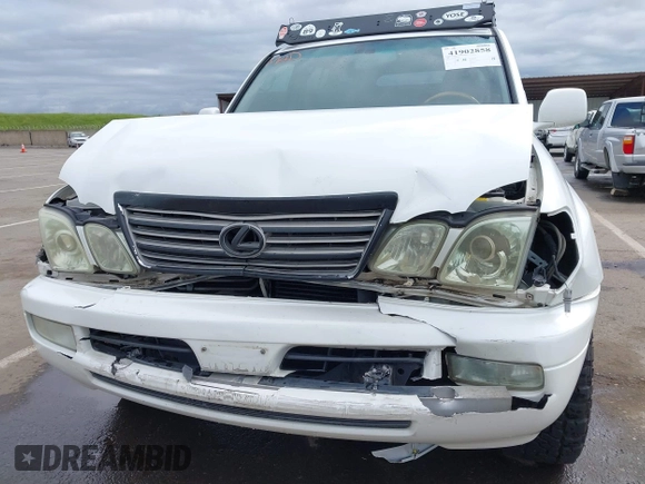 2004 Lexus LX 470 z VIN JTJHT00W043543915, wystawiony jako IAAI lot #41902858 z przebiegiem 110 454 mil mil oraz . Historia ofert i sprzedaży dostępna na DreamBid. Obrazek 6.