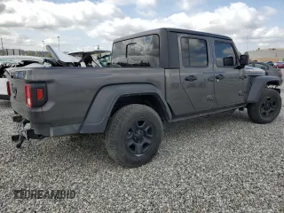 2023 Jeep Gladiator Freedom with VIN 1C6JJTAG9PL557861, listed as a Copart auction lot 50452955 with 44,716 mi miles and Salvage title. Bid and sale history available at DreamBid. Image 3.
