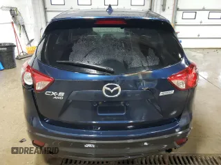 2015 Mazda CX-5 Grand Touring with VIN JM3KE4DY0F0493650, listed as a Copart auction lot 86371104 with 226,752 mi miles and Non Repairable. Bid and sale history available at DreamBid. Image 6.