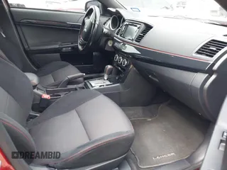 2017 Mitsubishi Lancer ES with VIN JA32U2FU6HU011946, listed as a IAAI auction lot 41918643 with 63,544 mi miles. Bid and sale history available at carsss.com. Image 5.
