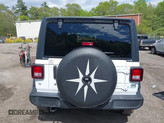 2020 Jeep Wrangler Unlimited Sport S with VIN 1C4HJXDG9LW229715, listed as a IAAI auction lot 42203008 with 63,683 mi miles and . Bid and sale history available at DreamBid. Image 16.