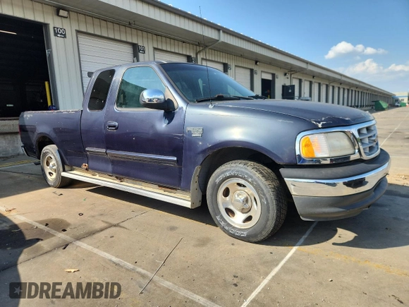 1999 Ford F-150 with VIN 1FTZX1729XNB58298, listed as a Copart auction lot 62369755 with 165,150 mi miles and Clean title. Bid and sale history available at DreamBid. Image 4.