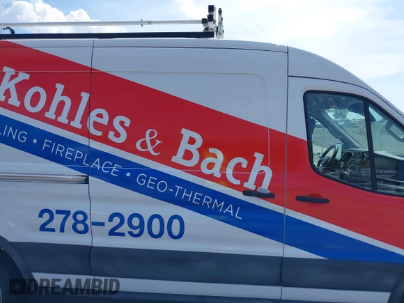 2023 Ford Transit Cargo with VIN 1FTBR1C80PKA43077, listed as a IAAI auction lot 40182475 with 15,656 mi miles and . Bid and sale history available at DreamBid. Image 14.
