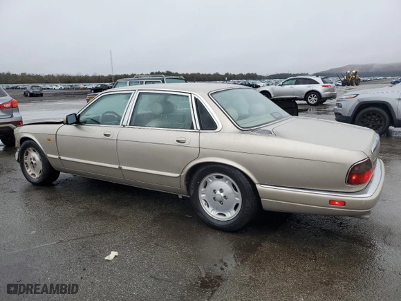 1995 Jaguar XJ Series Sedan with VIN SAJHX1743SC720991, listed as a Copart auction lot 43586965 with 138,504 mi miles and Salvage Title. Bid and sale history available at carsss.com. Image 2.