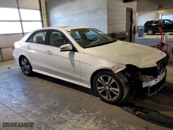 2015 Mercedes-Benz E-Class E 250 BlueTEC Luxury with VIN WDDHF0EB0FB089213, listed as a Copart auction lot 37906993 with 105,953 mi miles. Bid and sale history available at carsss.com. Image 4.