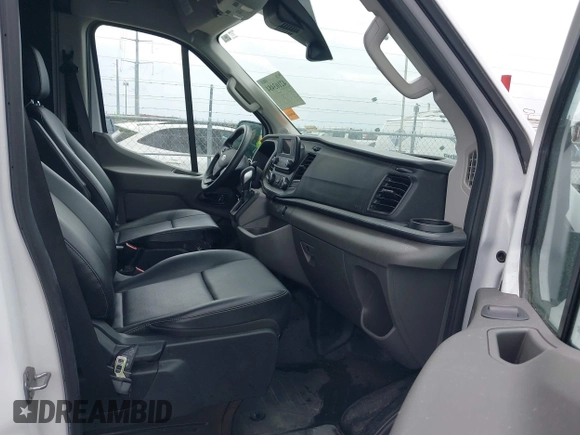 2023 Ford Transit Cargo with VIN 1FTBR1C8XPKC07063, listed as a IAAI auction lot 42103484 with 12,946 mi miles. Bid and sale history available at carsss.com. Image 5.