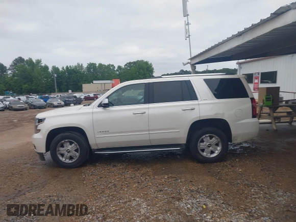 2015 Chevrolet Tahoe LTZ with VIN 1GNSCCKC1FR265370, listed as a IAAI auction lot 42131294 with 217,064 mi miles and . Bid and sale history available at DreamBid. Image 14.