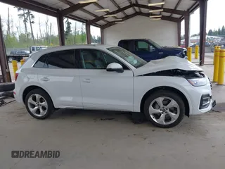 2021 Audi Q5 Premium Plus z VIN WA1BAAFY5M2004171, wystawiony jako IAAI lot #42140899 z przebiegiem 62 544 mil mil oraz . Historia ofert i sprzedaży dostępna na DreamBid. Obrazek 14.