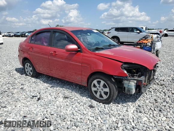 2011 Hyundai Accent GLS z VIN KMHCN4AC6BU621572, wystawiony jako Copart lot #57753025 z przebiegiem 108 395 mil mil oraz Szkoda całkowita • Salvage title. Historia ofert i sprzedaży dostępna na DreamBid. Obrazek 4.