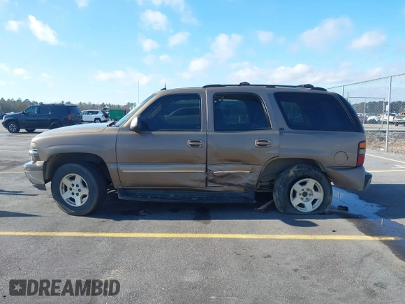 2004 Chevrolet Tahoe LT with VIN 1GNEC13Z24J170834, listed as a IAAI auction lot 41149637 with 362,679 mi miles and . Bid and sale history available at DreamBid. Image 14.