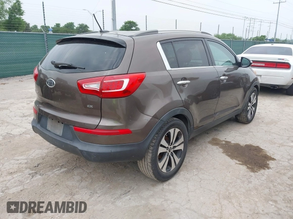 2011 Kia Sportage EX with VIN KNDPC3A23B7029574, listed as a IAAI auction lot 42168504 with 208,407 mi miles. Bid and sale history available at carsss.com. Image 4.