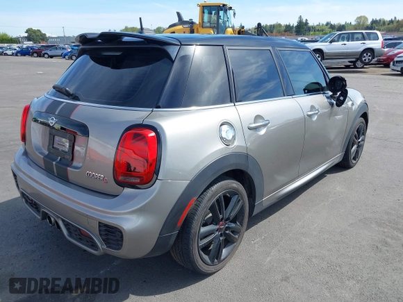2019 MINI Hardtop 4 Door Cooper S with VIN WMWXU3C5XK2H55160, listed as a IAAI auction lot 42024249 with 49,944 mi miles and . Bid and sale history available at DreamBid. Image 4.
