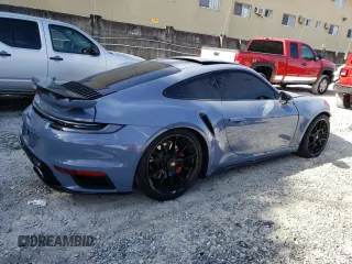 2023 Porsche 911 Turbo with VIN WP0AD2A94PS257369, listed as a Copart auction lot 48727904 with 6,700 mi miles. Bid and sale history available at carsss.com. Image 3.