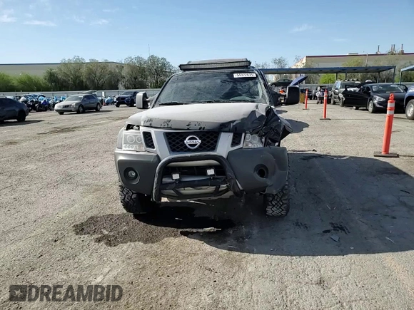 2013 Nissan Xterra S z VIN 5N1AN0NW7DN823046, wystawiony jako Copart lot #54372835 z przebiegiem 163 384 mil mil oraz Szkoda całkowita • Salvage title. Historia ofert i sprzedaży dostępna na DreamBid. Obrazek 14.