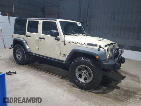 2012 Jeep Wrangler Unlimited Call of Duty MW3 with VIN 1C4BJWFGXCL105130, listed as a Copart auction lot 85747614 with 77,953 mi miles and Salvage title. Bid and sale history available at DreamBid. Image 4.