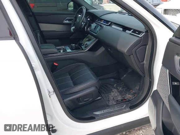 2018 Land Rover Range Rover Velar R-Dynamic SE z VIN SALYL2RX6JA715634, wystawiony jako IAAI lot #41263459 z przebiegiem 114 616 mil mil oraz . Historia ofert i sprzedaży dostępna na DreamBid. Obrazek 5.