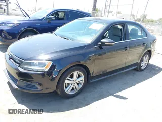 2013 Volkswagen Jetta Hybrid SE with VIN 3VW637AJ8DM299657, listed as a IAAI auction lot 42538101 with 128,822 mi miles and . Bid and sale history available at DreamBid. Image 2.