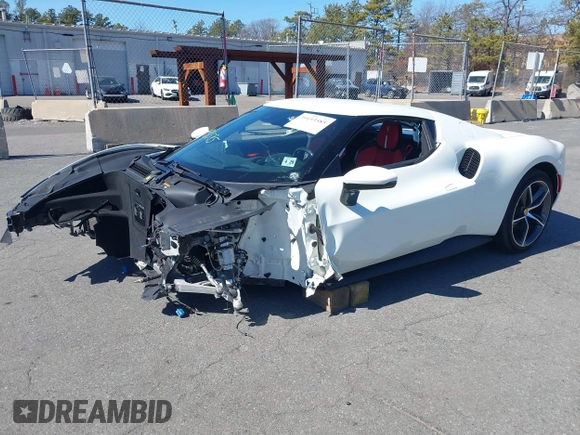 2024 Ferrari 296 GTB z VIN ZFF99SLA6R0303425, wystawiony jako IAAI lot #39193585 z przebiegiem Nie podano mil oraz . Historia ofert i sprzedaży dostępna na DreamBid. Obrazek 2.