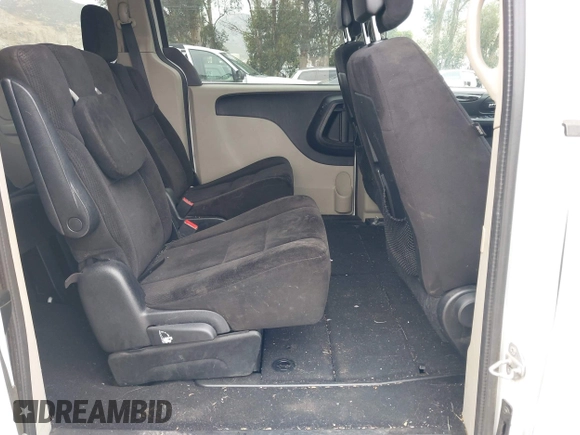 2014 Dodge Grand Caravan SXT with VIN 2C4RDGCG1ER304836, listed as a IAAI auction lot 42049558 with 186,831 mi miles and . Bid and sale history available at DreamBid. Image 8.