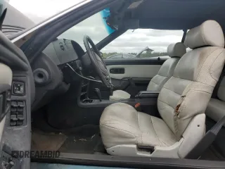 1994 Chrysler LeBaron z VIN 1C3EU4530RF189347, wystawiony jako Copart lot #72474654 z przebiegiem 38 868 mil mil oraz Tytuł czysty. Historia ofert i sprzedaży dostępna na DreamBid. Obrazek 7.