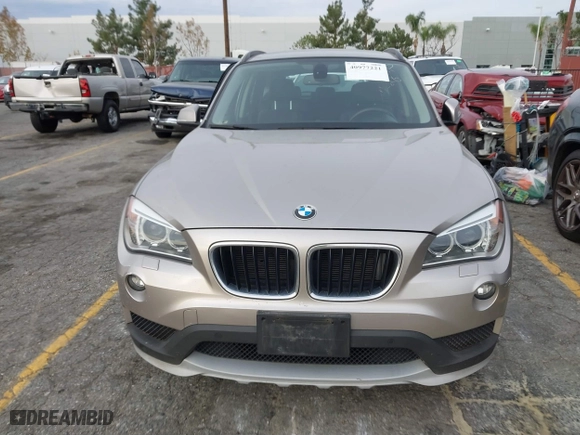 2015 BMW X1 xDrive28i with VIN WBAVL1C55FVY41749, listed as a IAAI auction lot 40977221 with 120,924 mi miles. Bid and sale history available at carsss.com. Image 12.