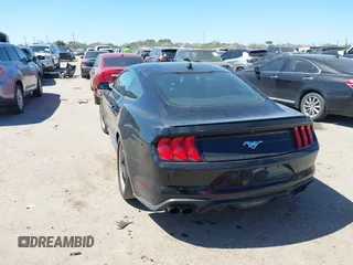 2022 Ford Mustang EcoBoost with VIN 1FA6P8TH8N5140335, listed as a IAAI auction lot 41777549 with 9,722 mi miles and . Bid and sale history available at DreamBid. Image 3.