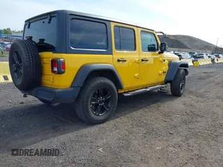 2021 Jeep Wrangler Unlimited Sport S with VIN 1C4HJXDN4MW744315, listed as a IAAI auction lot 42242941 with 35,344 mi miles and . Bid and sale history available at DreamBid. Image 4.