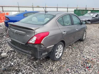 2017 Nissan Versa Sedan SV with VIN 3N1CN7AP5HL858214, listed as a IAAI auction lot 41943167 with 131,546 mi miles. Bid and sale history available at carsss.com. Image 4.