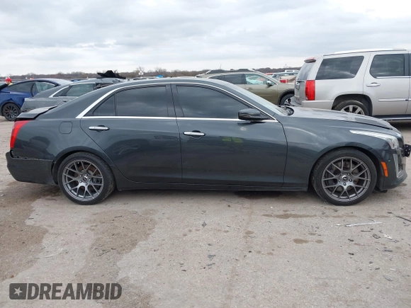 2014 Cadillac CTS Vsport Premium RWD z VIN 1G6AV5S8XE0175517, wystawiony jako IAAI lot #41126885 z przebiegiem 140 667 mil mil oraz . Historia ofert i sprzedaży dostępna na DreamBid. Obrazek 13.