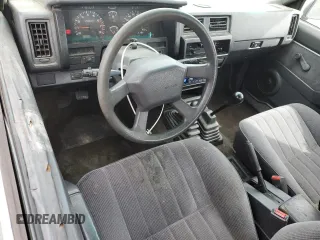 1993 Nissan Frontier SE z VIN 1N6HD16Y0PC408188, wystawiony jako Copart lot #71028394 z przebiegiem 258 939 mil mil oraz Szkoda całkowita • Salvage title. Historia ofert i sprzedaży dostępna na DreamBid. Obrazek 8.