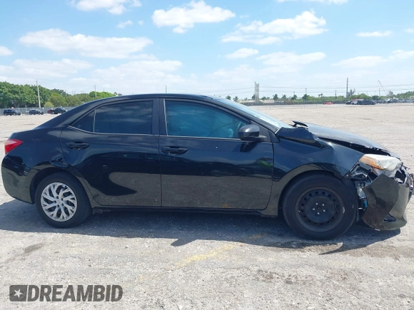 2019 Toyota Corolla L z VIN 5YFBURHE1KP865263, wystawiony jako IAAI lot #42153766 z przebiegiem 62 827 mil mil oraz . Historia ofert i sprzedaży dostępna na DreamBid. Obrazek 13.