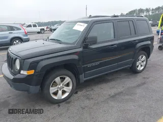 2014 Jeep Patriot Latitude with VIN 1C4NJRFB7ED713462, listed as a IAAI auction lot 42036671 with 116,276 mi miles. Bid and sale history available at carsss.com. Image 2.