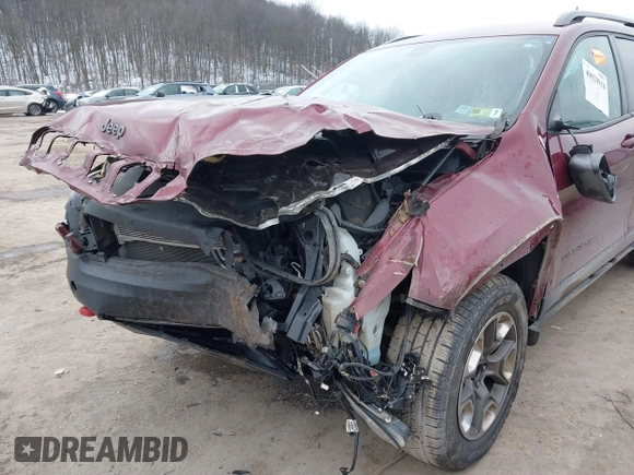 2019 Jeep Cherokee Trailhawk with VIN 1C4PJMBX1KD314149, listed as a IAAI auction lot 40929910 with 77,000 mi miles and . Bid and sale history available at DreamBid. Image 6.