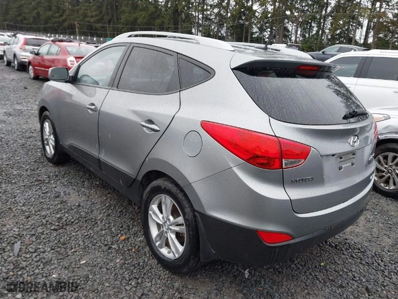 2011 Hyundai Tucson Limited with VIN KM8JUCAC7BU315680, listed as a IAAI auction lot 41577234 with 32,558 mi miles. Bid and sale history available at carsss.com. Image 3.