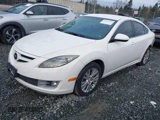 2009 Mazda 6 i Touring with VIN 1YVHP82A195M01537, listed as a IAAI auction lot 41471542 with 180,175 mi miles and . Bid and sale history available at carsss.com. Image 17.