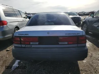 1994 Chevrolet Cavalier with VIN 1G1JC1440R7214501, listed as a Copart auction lot 49876215 with 51,613 mi miles and Clean Title. Bid and sale history available at DreamBid. Image 6.