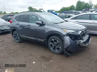 2018 Honda CR-V Touring с VIN 7FARW2H90JE018638, выставлен на аукционе IAAI как лот 42374831 с пробегом 100 792 миль миль и . История ставок и продаж доступна на DreamBid. Изображение 1.